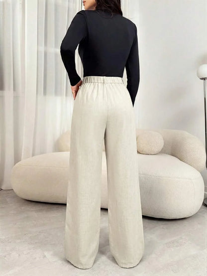 Gigi | Pleated High Waist Wide Leg Trousers with Elasticated Back