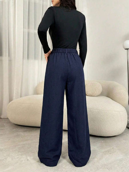 Gigi | Pleated High Waist Wide Leg Trousers with Elasticated Back